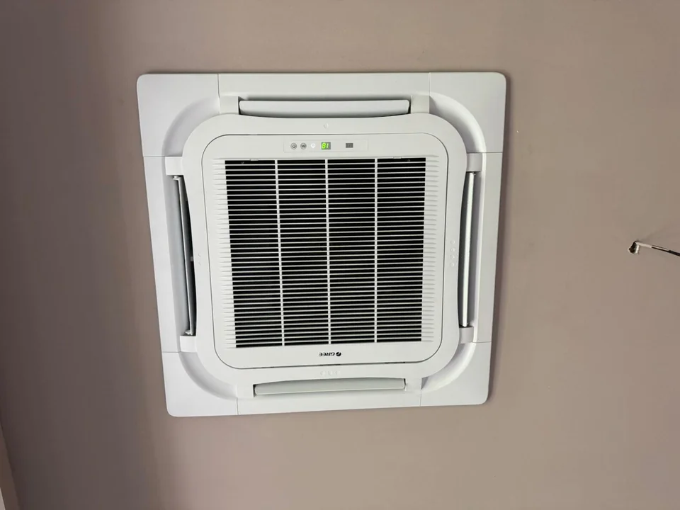 Ceiling cassette air-conditioning unit installed in a residential room