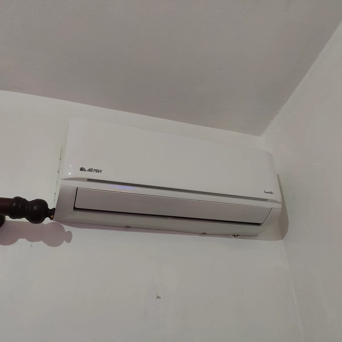 Split air-conditioning unit mounted on an interior wall