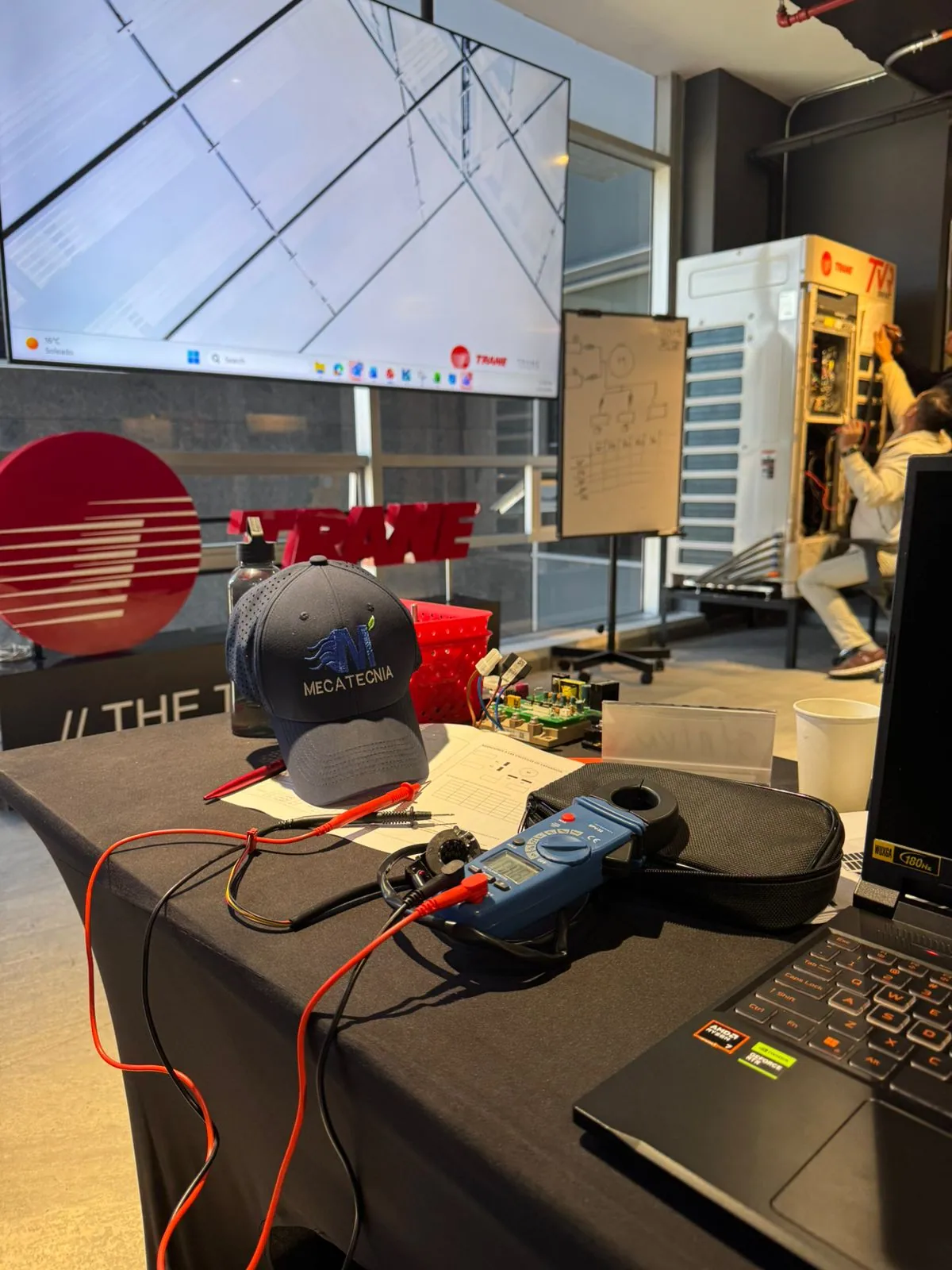 Instruments and technical materials beside displays in a training space