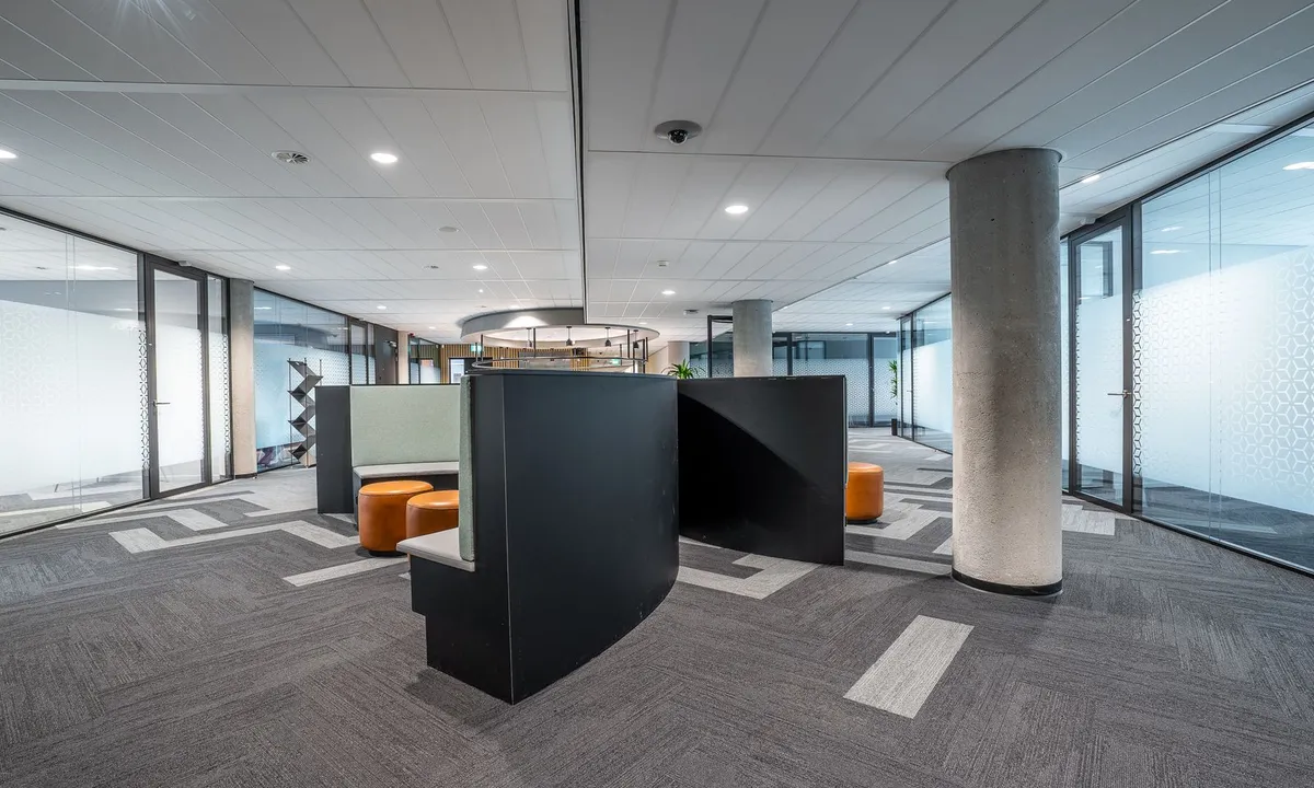 Modern office with workstations and large windows
